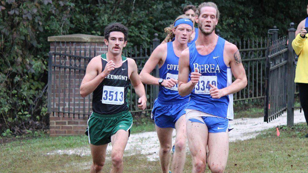 Freshman Conner Moranos (left) competes against runners from Covenant and Berea in the USA South Championships. PHOTO / DANIELLE PERCIVAL