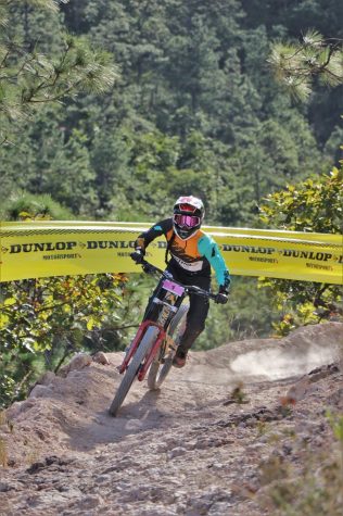 Mariajose Montoya rides her bike in the Latin American Downhill Mountain Bike Championship in Colombia. PHOTO//MARIAJOSE MONTOYA