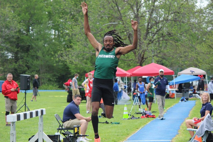 Anthony Jordan competing in the long jump on day 2 of the USA South Track and Field Championship in Spring 2021. PHOTO//KARL MOORE