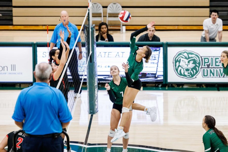 Sophomore+Jessica+Sconyers+goes+for+the+kill+against+LaGrange.+Sconyers+led+the+team+with+nine+kills+and+six+blocks+as+the+Lady+Lions+swept+the+Panthers+on+Oct.+1.+PHOTO+%2F%2F+KARL+MOORE