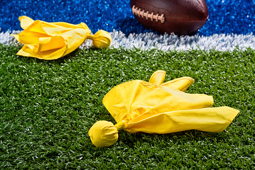 Penalty flags have been used by officials to keep players in check. Now it seems they’ve been used to decide who wins and who loses. PHOTO// iSTOCK