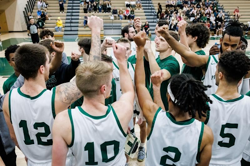 Piedmont men’s basketball team huddle ahead of game 
PHOTO// Karl Moore
