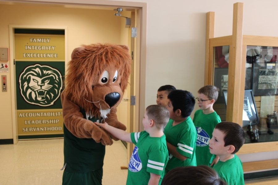 Leo the Lion welcomed local elementary school students to Piedmont University’s sixth annual PAL games. The PAL games were organized so that Piedmont University students could make a connection with local elementary students with special needs. PHOTO//Alexis Ware