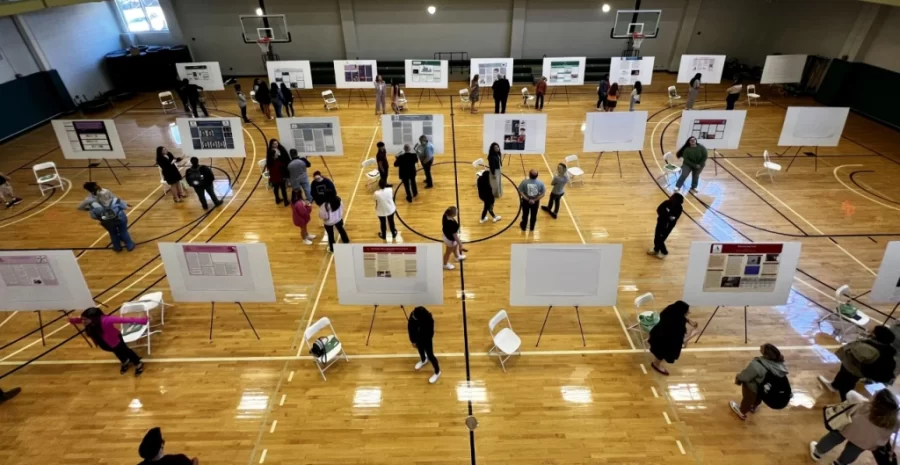 Piedmont University held their 5th Symposium on April 12th at the Demorest campus. In the common's gym, twenty-four students present their research posters to whomever takes interest in their topic as they walk up and down each row. PHOTO//Kelsey Skendziel