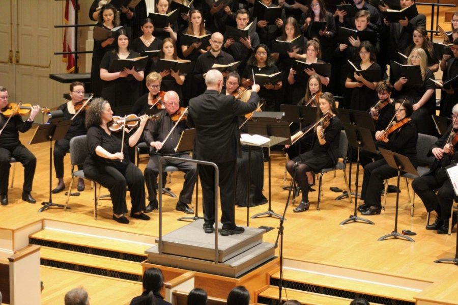 Dr. Wallace Hinson conducts his ensemble in their “Beyond the Viel” performance on Mar. 21. This performance concluded Hinson’s career at Piedmont Univerisity. PHOTO//James Whitmer
