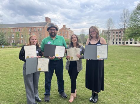 From left, Hannah Osborne, Joe Dennis, Samantha Carvallo and Rowan Edmonds collected awards given to The Roar at the 2023 Georgia College Press Association Ceremony in Athens.