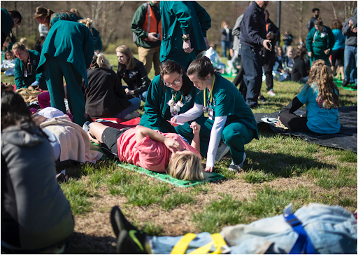 Nursing students are seen practicing their emergency response skills during the disaster drill in 2021.