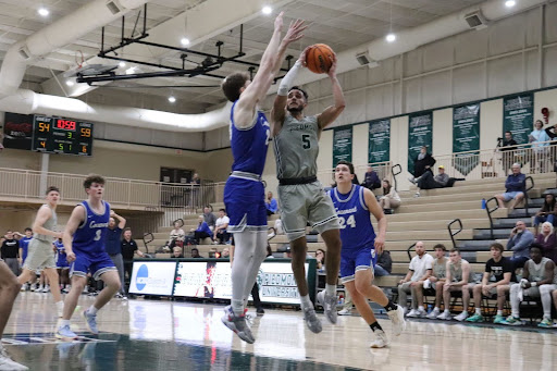 Ryan Jolly looks to attack the basket in a competition at home against Covenant College. Jolly has delivered for the Lions every time he has stepped onto the hardwood floors of Cave Arena. 