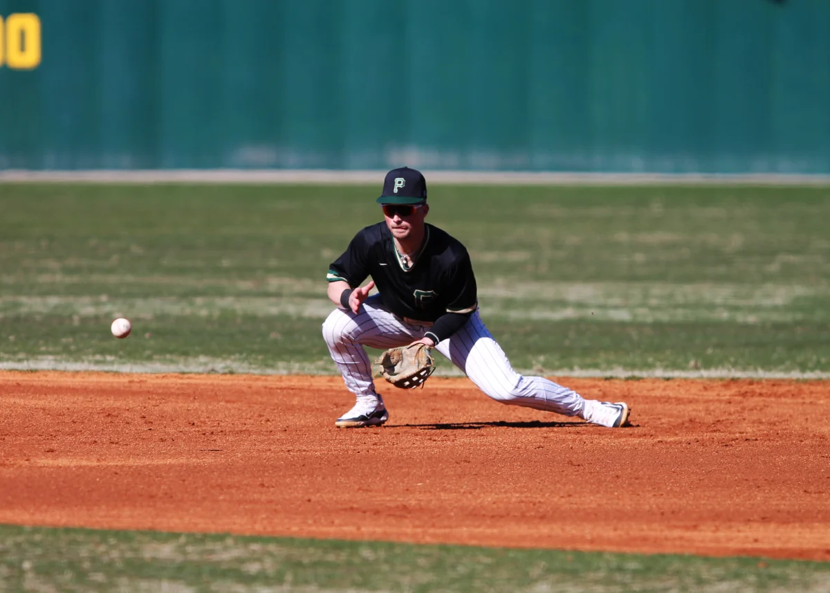 Lions shortstop Kolton Hicks fields a ground ball against Wilmington College in a Piedmont victory 12-2 earlier in the season.