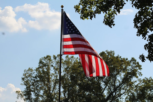 Piedmont University’s own President flies an American flag to celebrate Team USA.