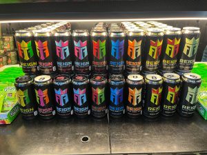 REIGN energy drinks located in the marketplace.