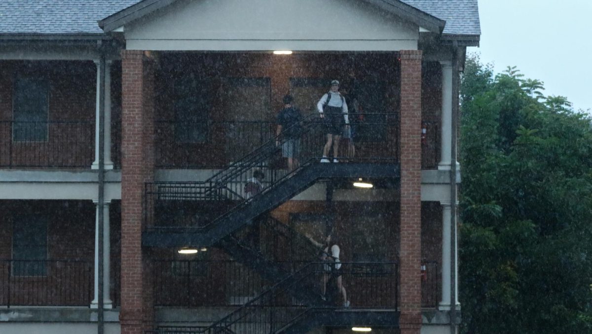 Students head to their dorms to take shelter from Hurricane Helene.