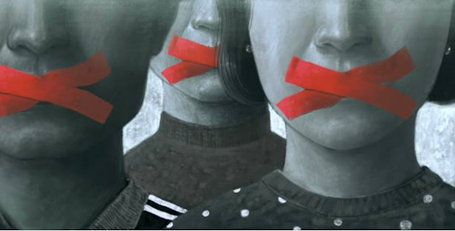 People have red tapes placed over their mouths to signify internet censorship effects on free speech. 