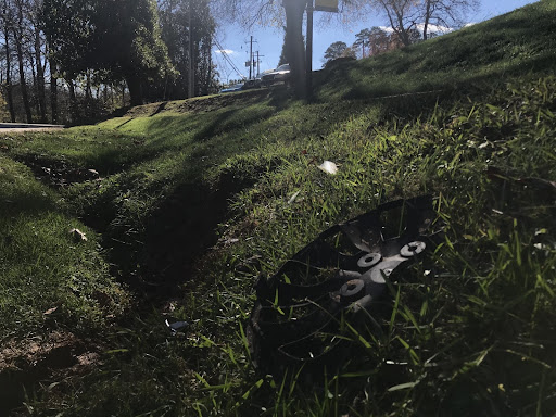 Debris from the car crashed behind Arrendale Library.