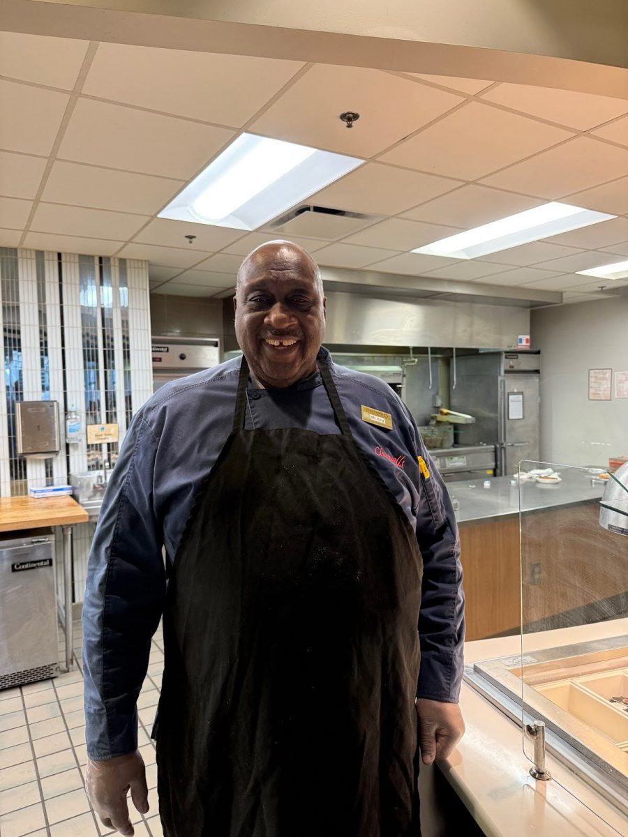 Mr. King at the grill after rush hour in the cafe. 