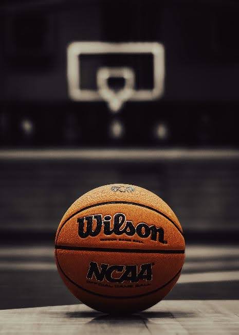 A basketball featuring the NCAA logo, the initiator of the NIL debate. (unsplash.com)