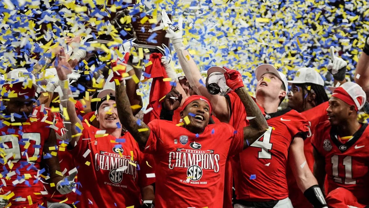 Georgia celebrates the overtime win over Texas in the SEC Championship game on Dec. 7, 2024. (John Bazemore)