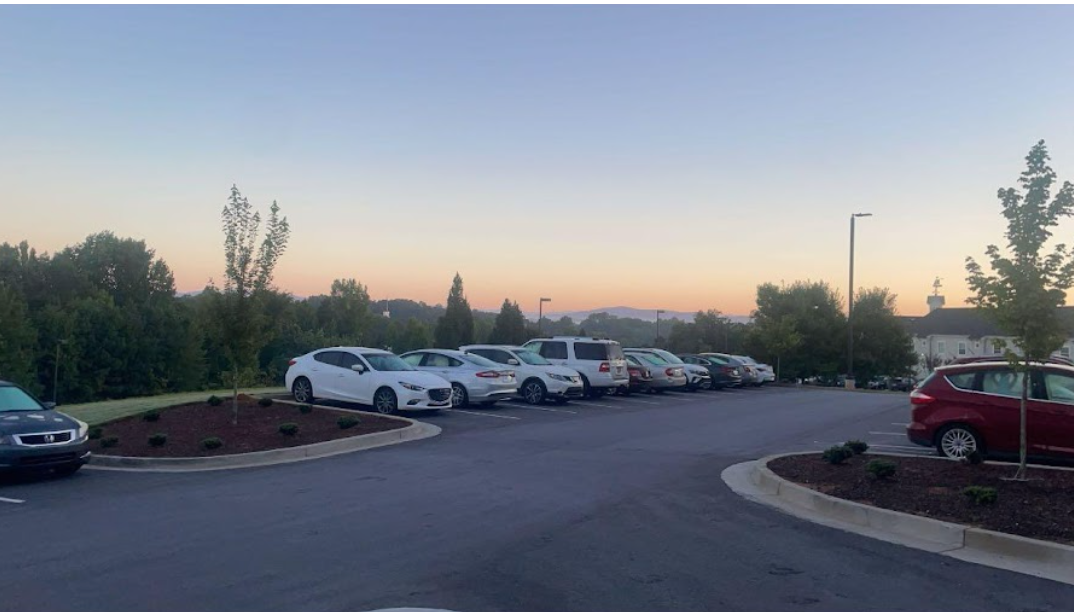 Picture of a sunrise over the Georgia mountains from the entrance of Mystic Hall during the springtime.