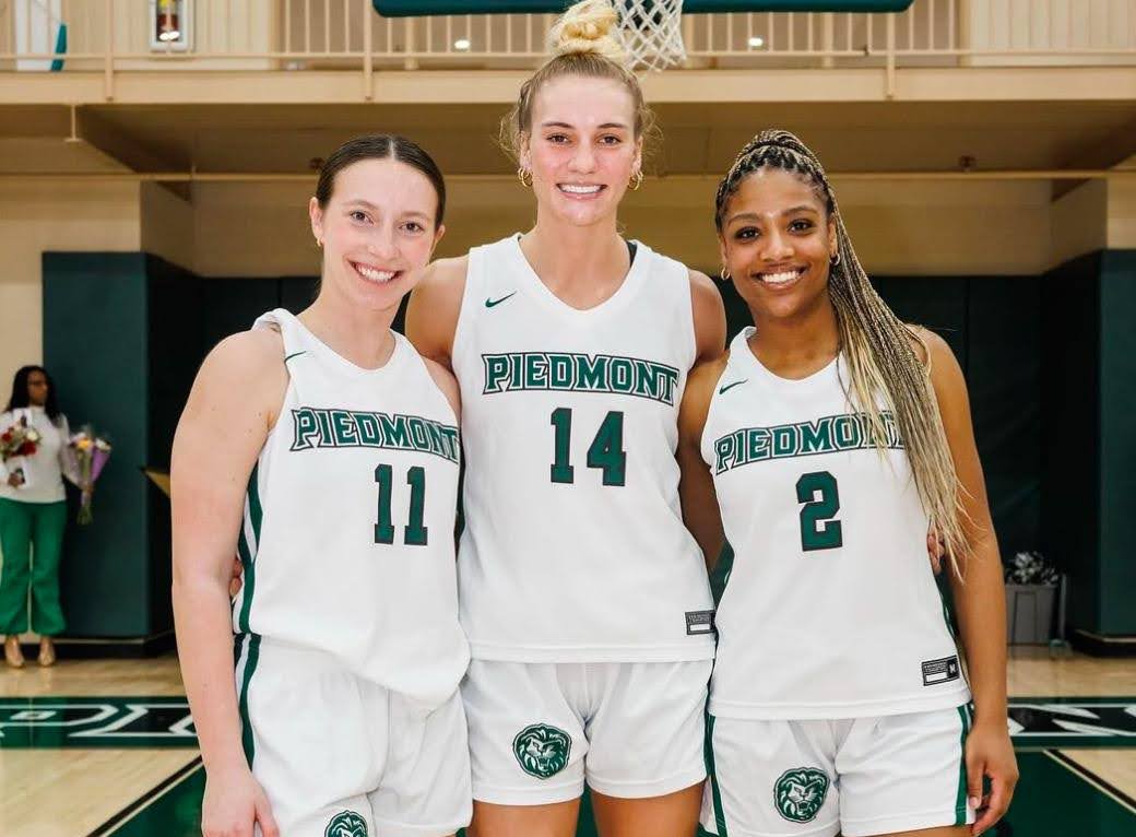 Seniors Ashley Scott, Andelin Hill and Nae-Nae Eades (from left to right) in Cave Arena on Senior Day. (@piedmontlions on Instagram)