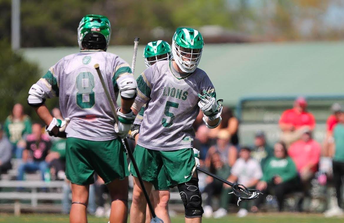 Eric Fewell (left) and Andrew Pagano (right) communicating with the Piedmont bench. (@piedmontlax on Instagram)