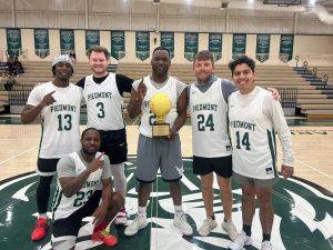 TEAM PIEDMONT posing happily as the new champions of intramural basketball tournament.