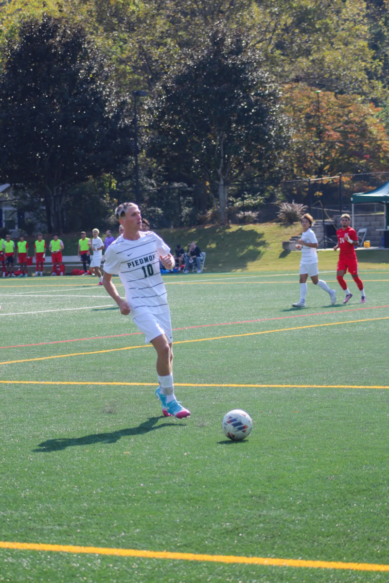 Senior Colin Vogel pushes the ball down the field. The Lions upset LaGrange College to move to the CCS semifinals.