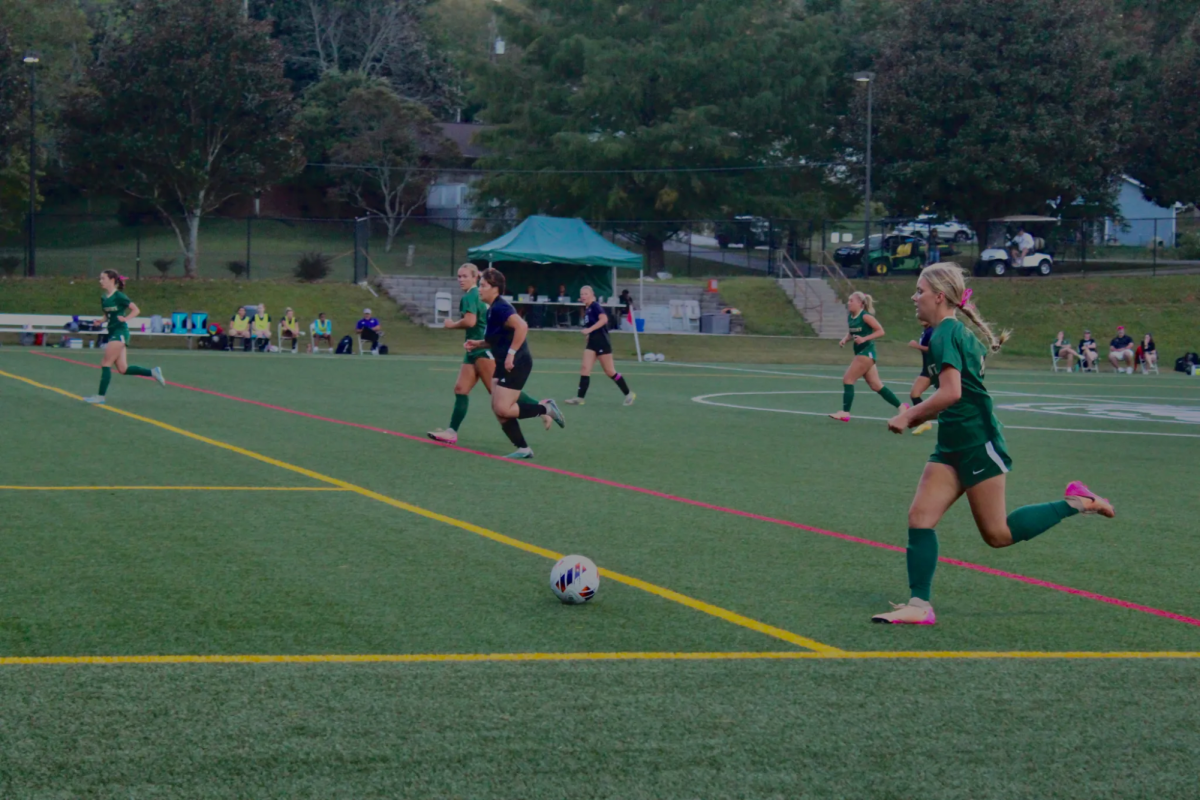 Sophomore defender Katelyn Brown brings the ball up the field in a 4-0 win over Wesleyan. The Lady Lions have won seventh straight games.