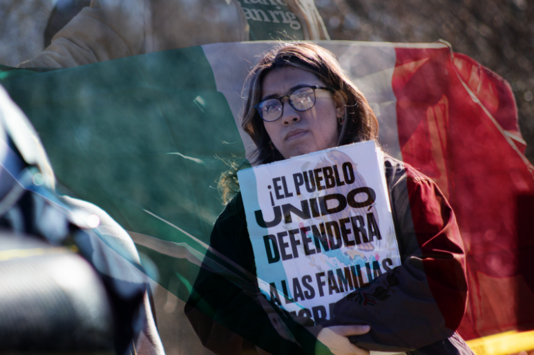 Senior Arly Lerma holds up a sign protesting ICE. The death of Renee Good, along with escalating tensions between citizens and ICE, has resulted in many taking to the streets in protest and solidarity.