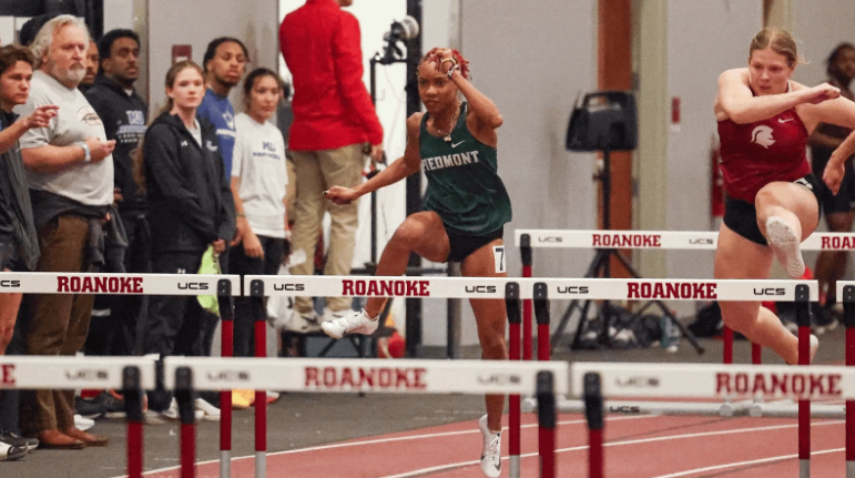 Michelle Cates competing in hurdles in the 2025 season at the Roanoke Invitational.